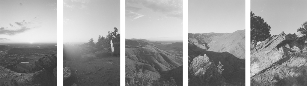 Five black-and-white photographs overlooking valleys and mountain-sides against a brightly lit sky.