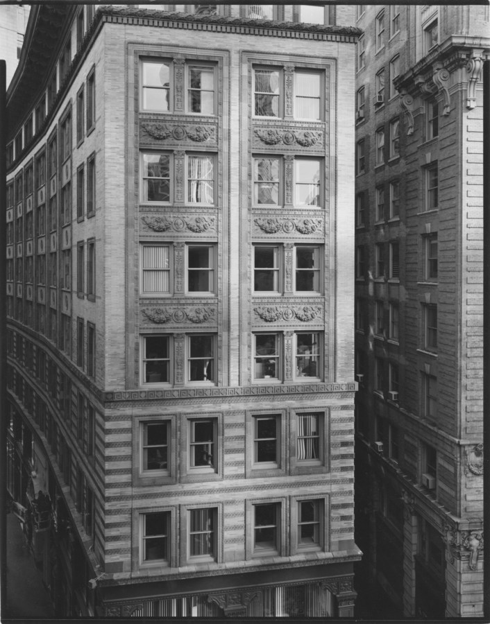Black and white photograph of the exterior facade of a building