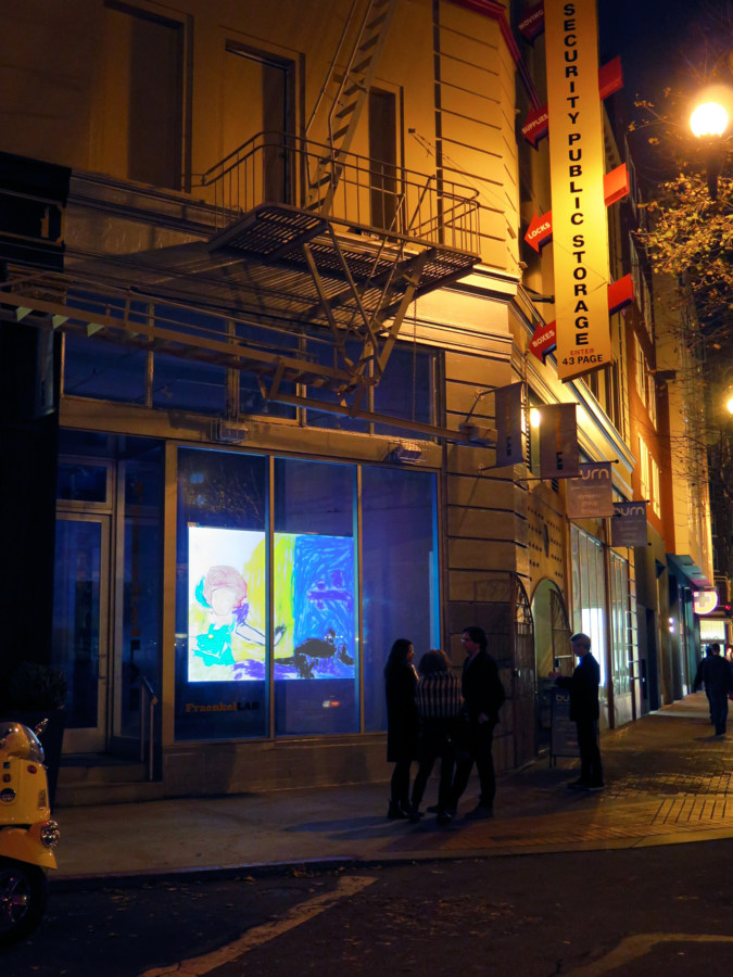 Color image of gallery exterior projecting animation inside and outside space