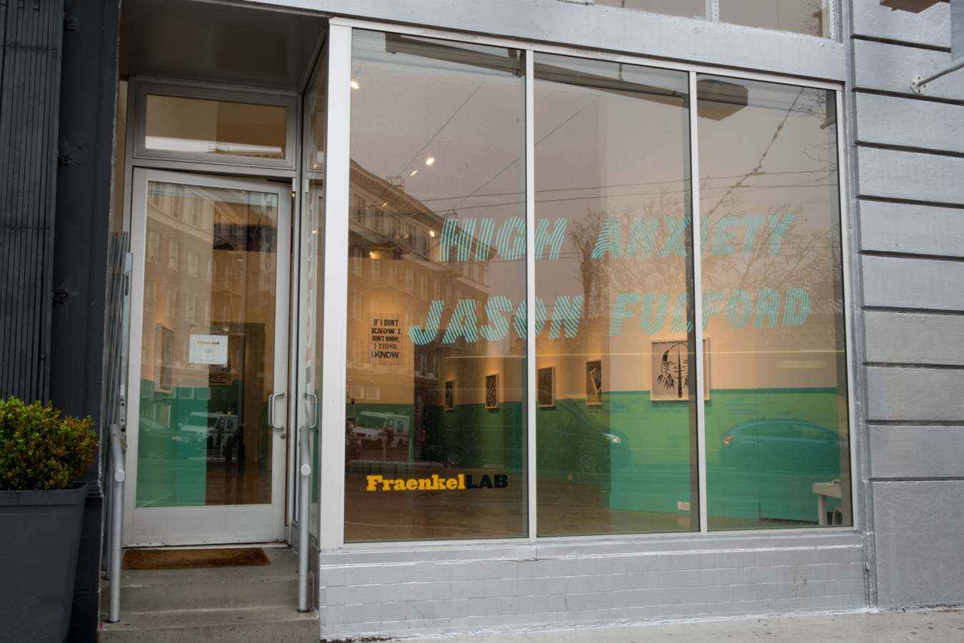 Color image of gallery exterior with decals reading 'High Anxiety Jason Fulford'