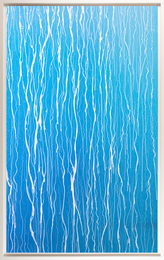 Color print of white rivulets of liquid running vertically down a bright blue background