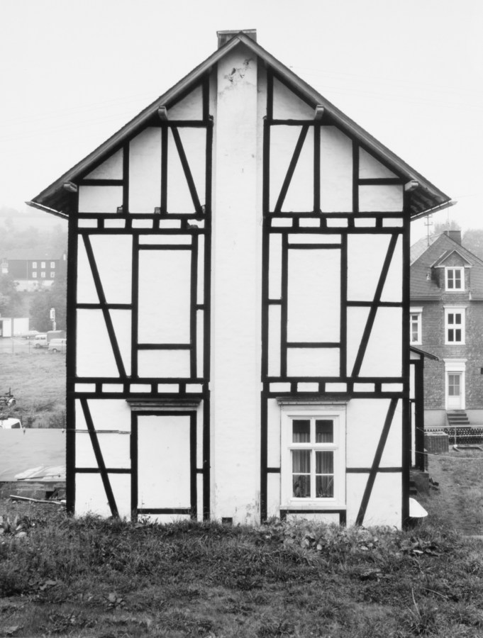 black and white photograph of a house facade