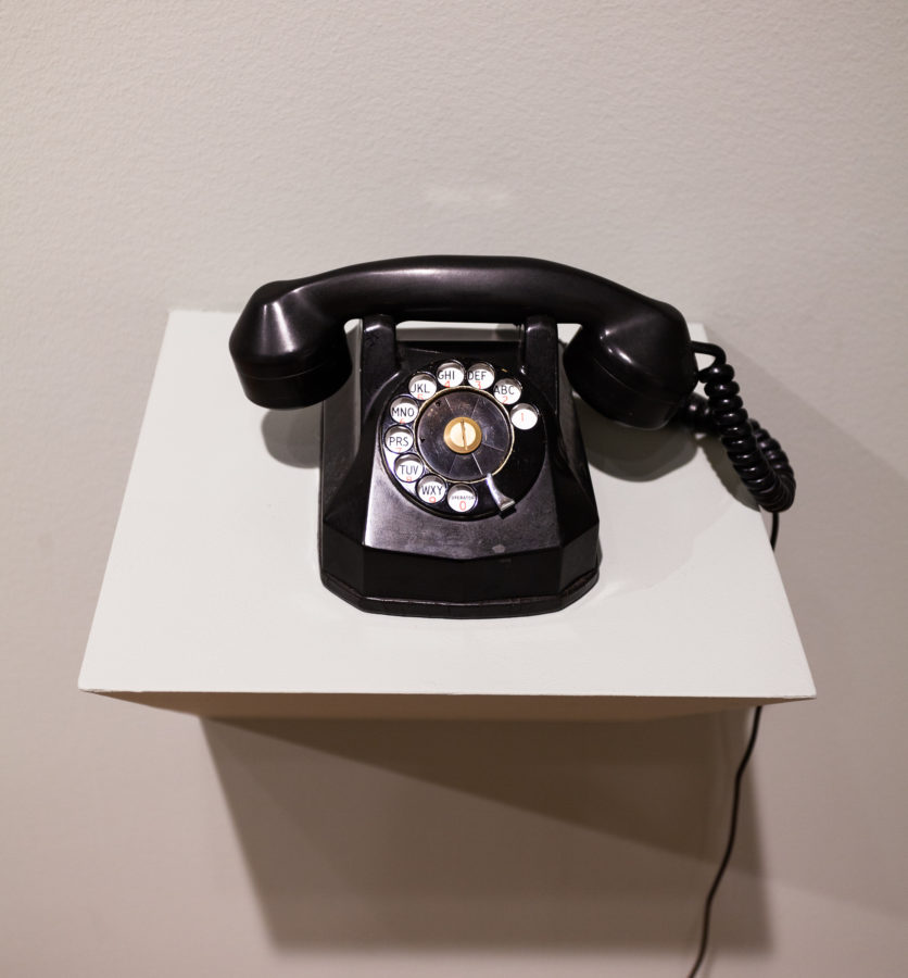 Photograph of a sculpture of a rotary phone
