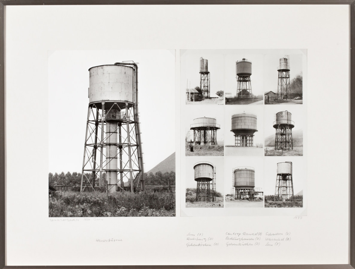 Framed black and white photographs of water towers