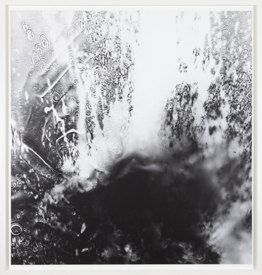 Black and white photogram of splashing water