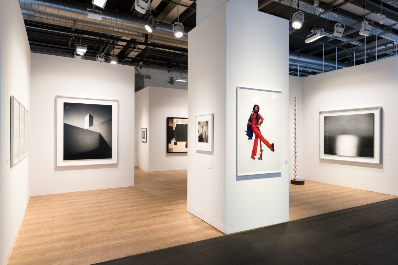 Installation view of artwork on display in an art fair booth