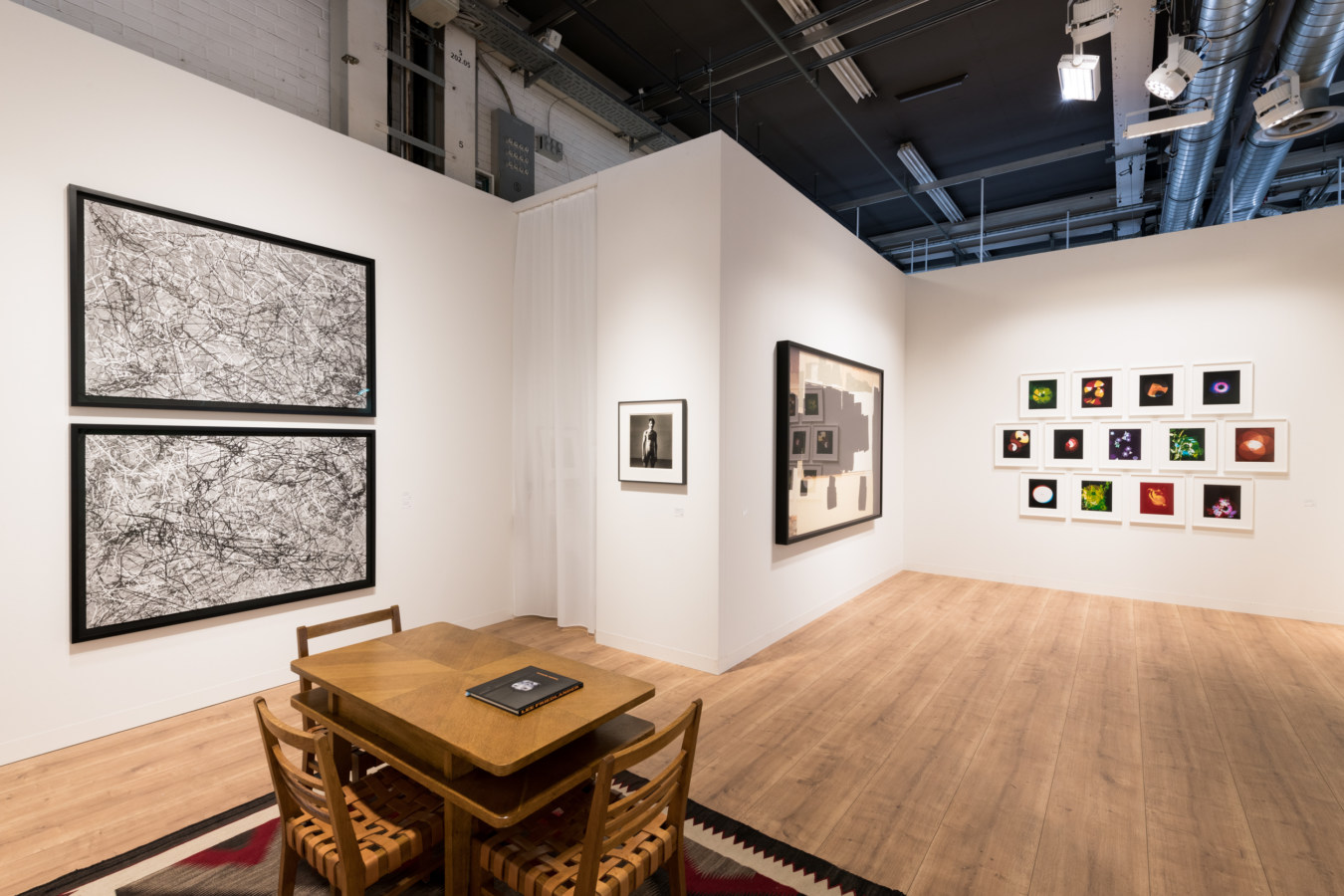 Installation view of artwork on display in an art fair booth