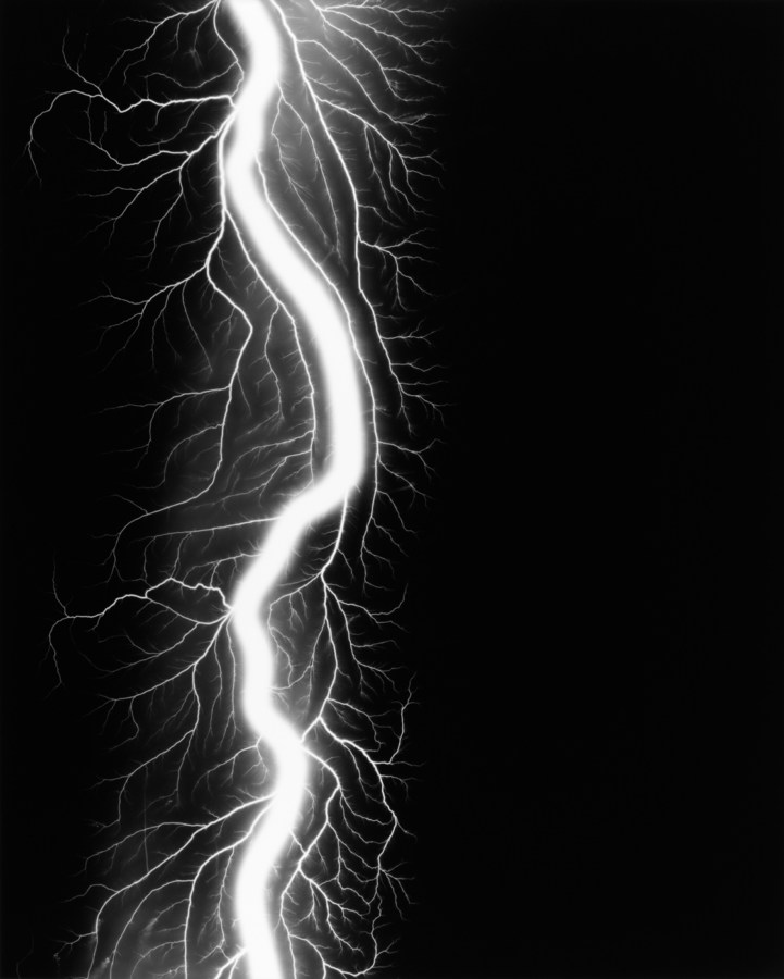Black and white photograph of lighting striking