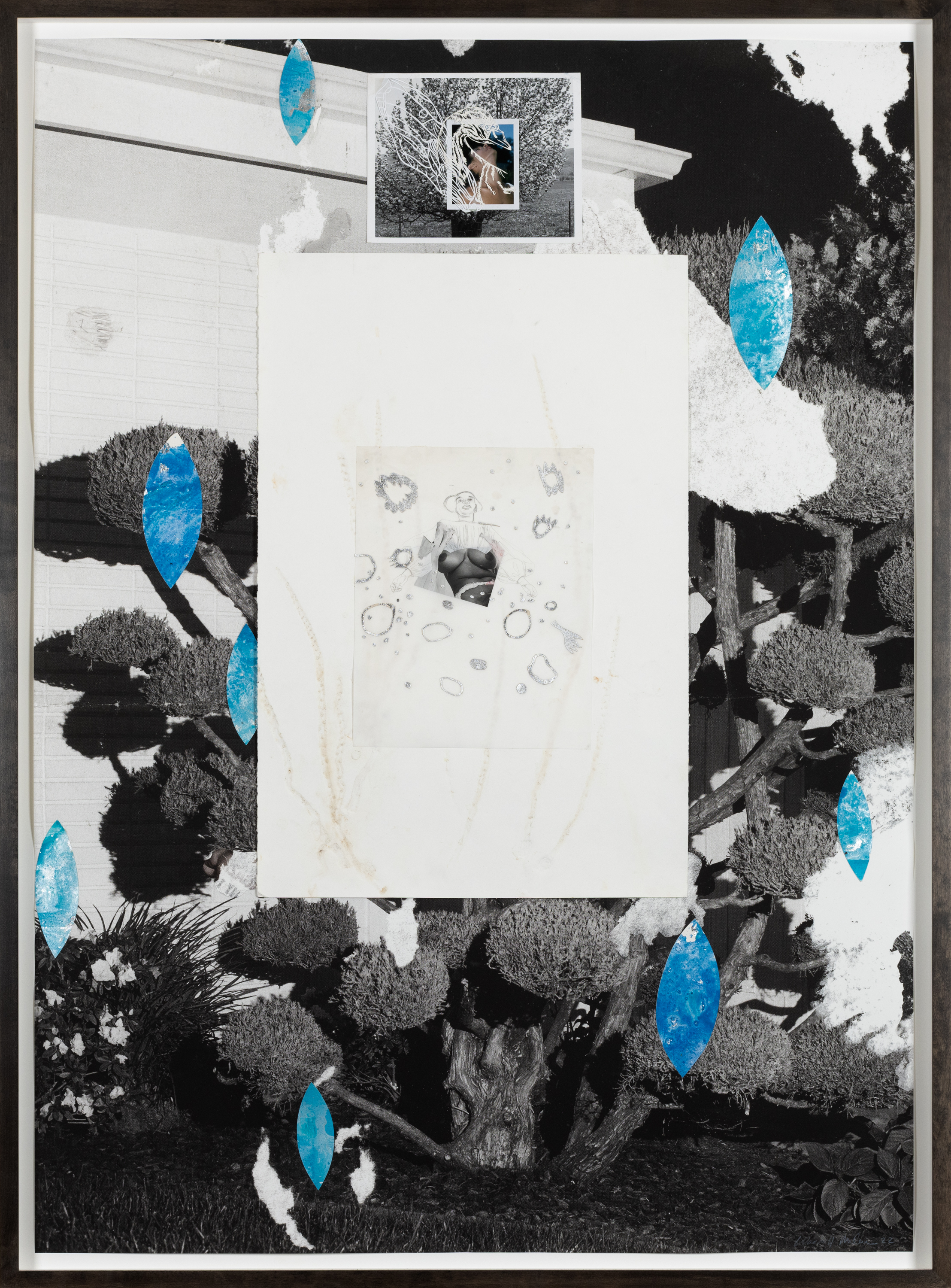Color image of a mixed media collage made with black and white photographs and swatches of white and blue paint