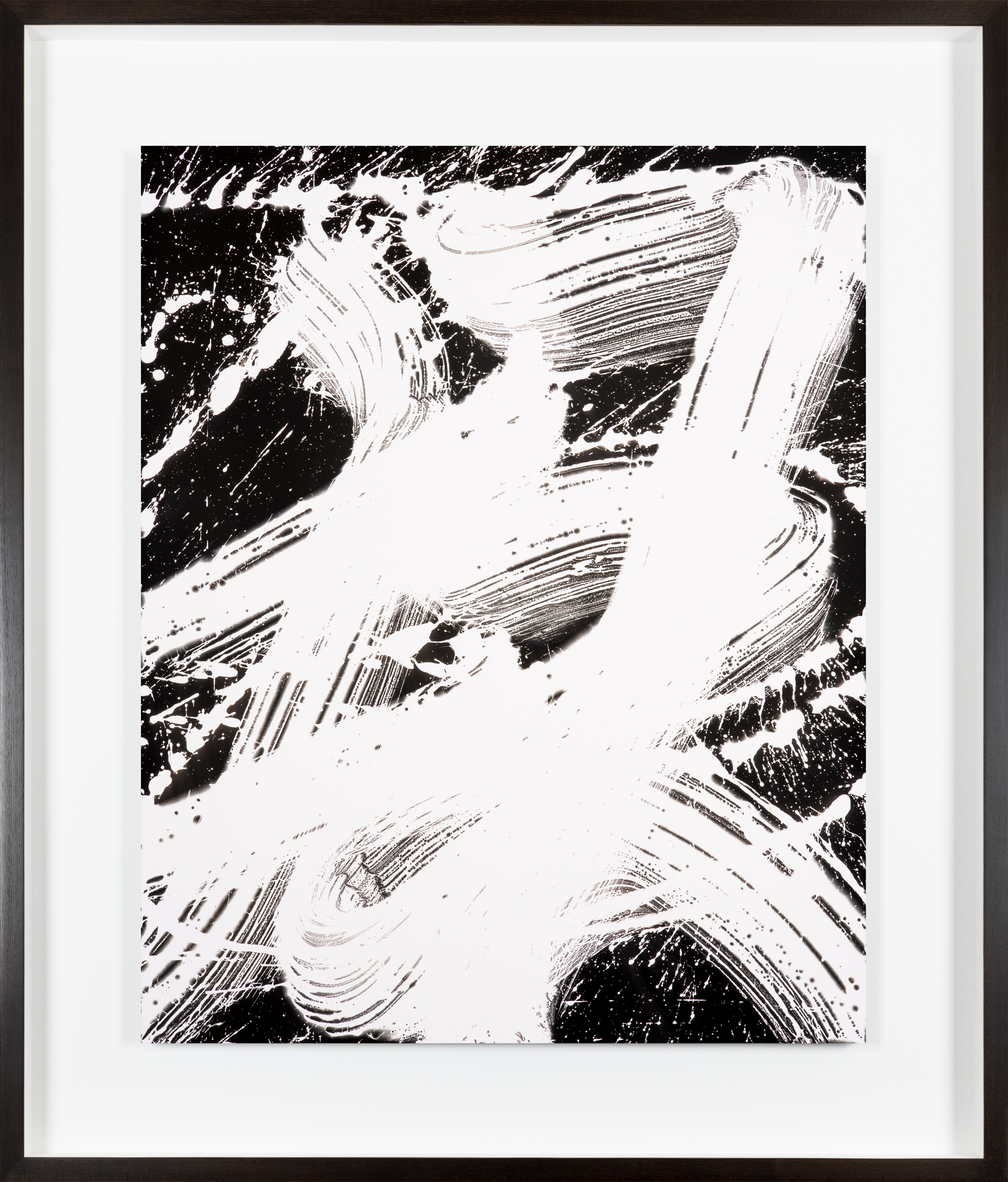 A color image of a framed artwork depicting white expressive brush strokes painted on a black background