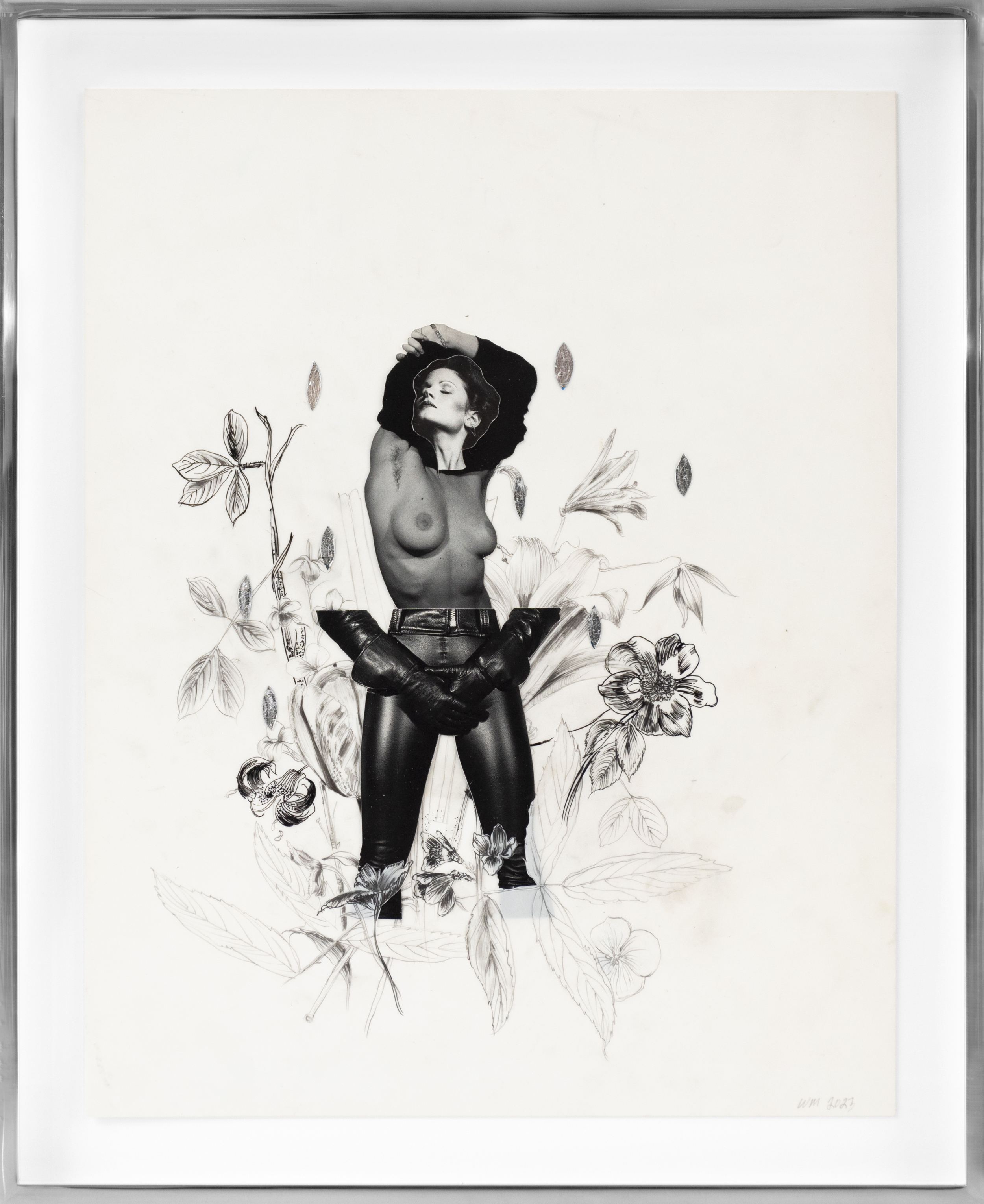Color image of black and white mixed media collage depicting a semi nude female figure amongst flowers framed in aluminum