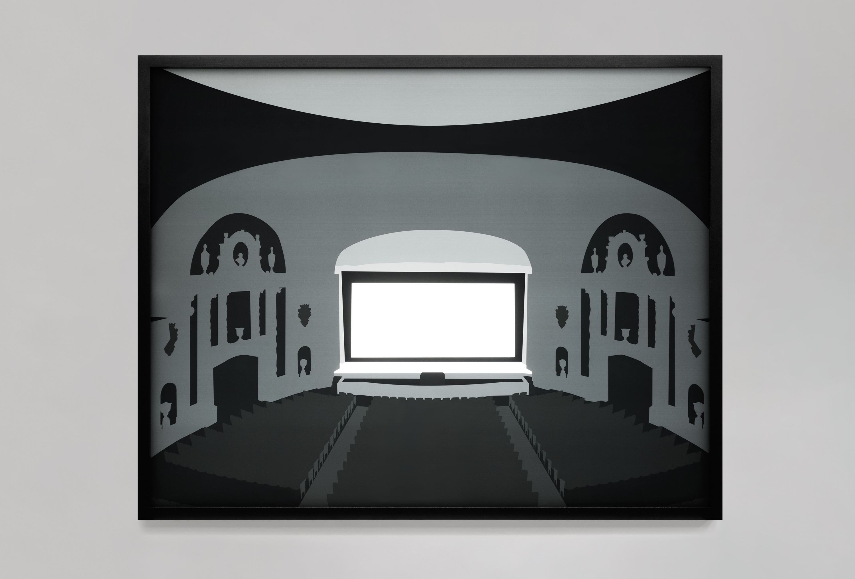 Color image of a black and white transparency on a light box depicting the inside of an empty theatre